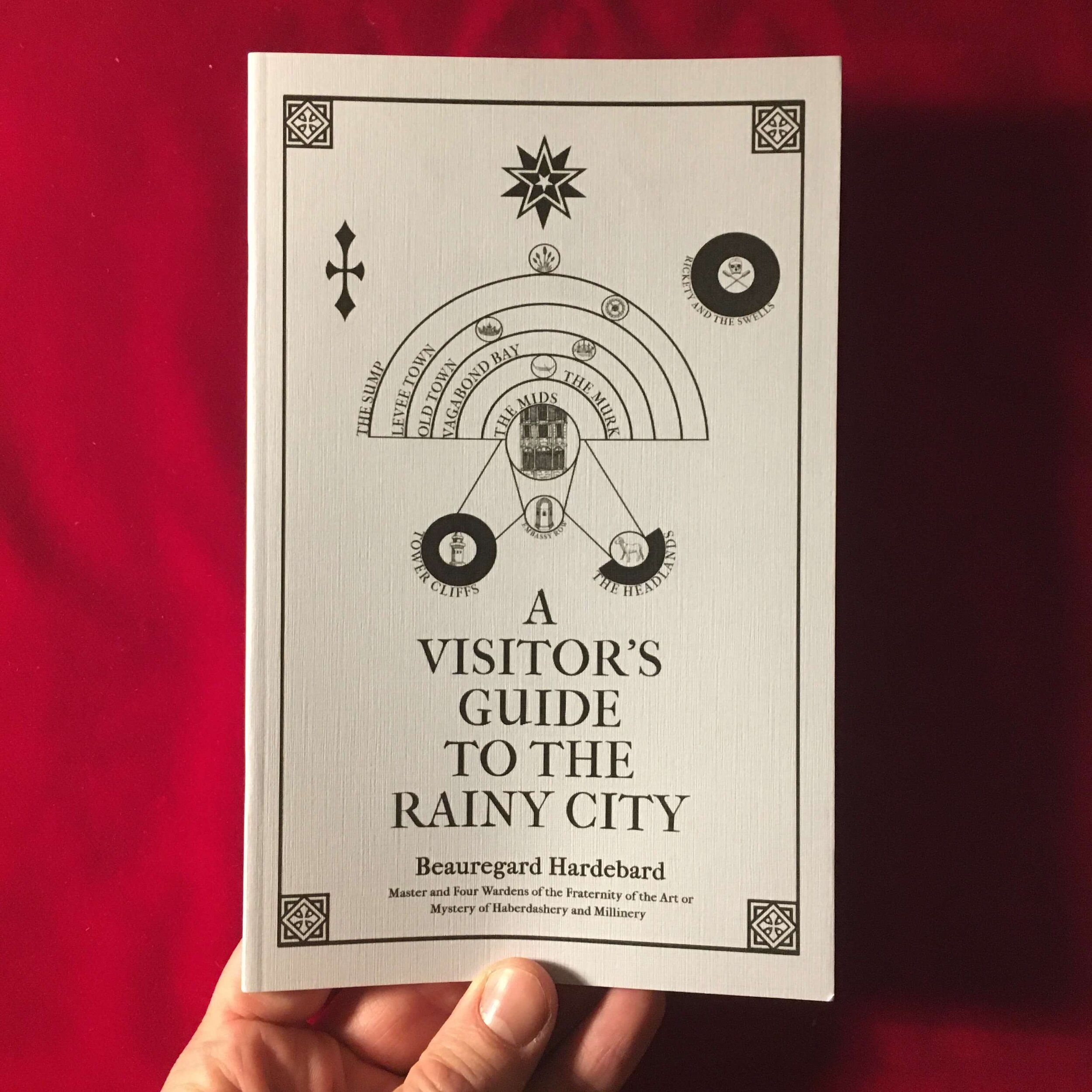 Beauregard Hardebard A VISITOR'S GUIDE TO THE RAINY CITY Rulebook