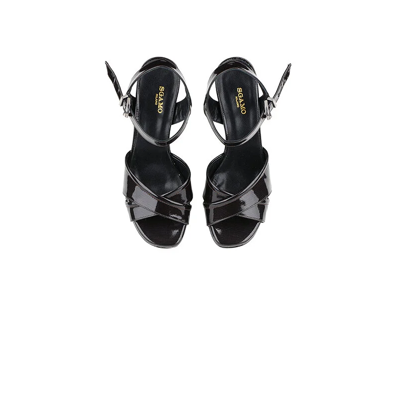 Pair of black high-heeled sandals with crisscross straps and ankle buckles