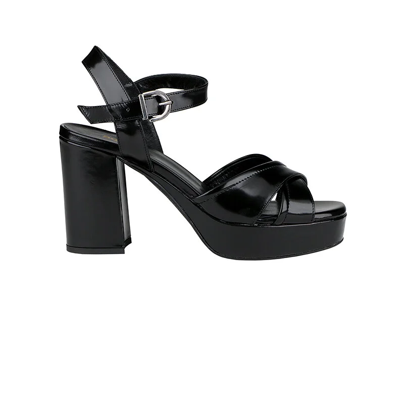 Black high-heeled sandal with an ankle strap and block heel.