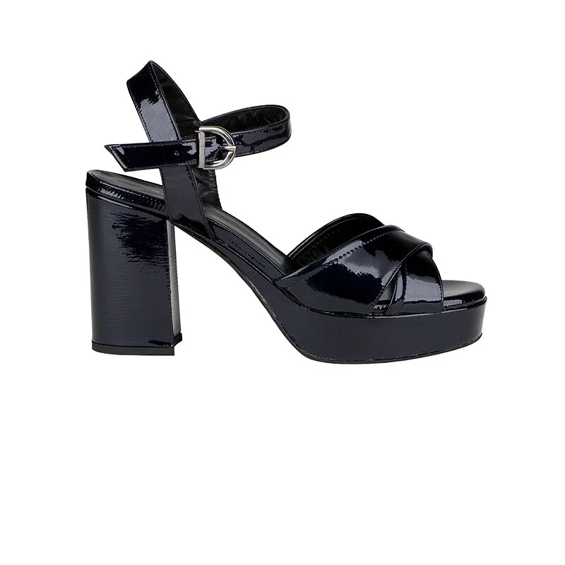 Black patent leather high-heeled sandal with buckle strap.