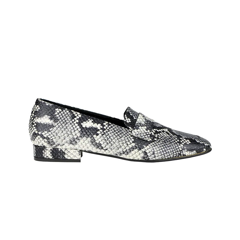 Black and white snakeskin-patterned loafer shoe with low heel.