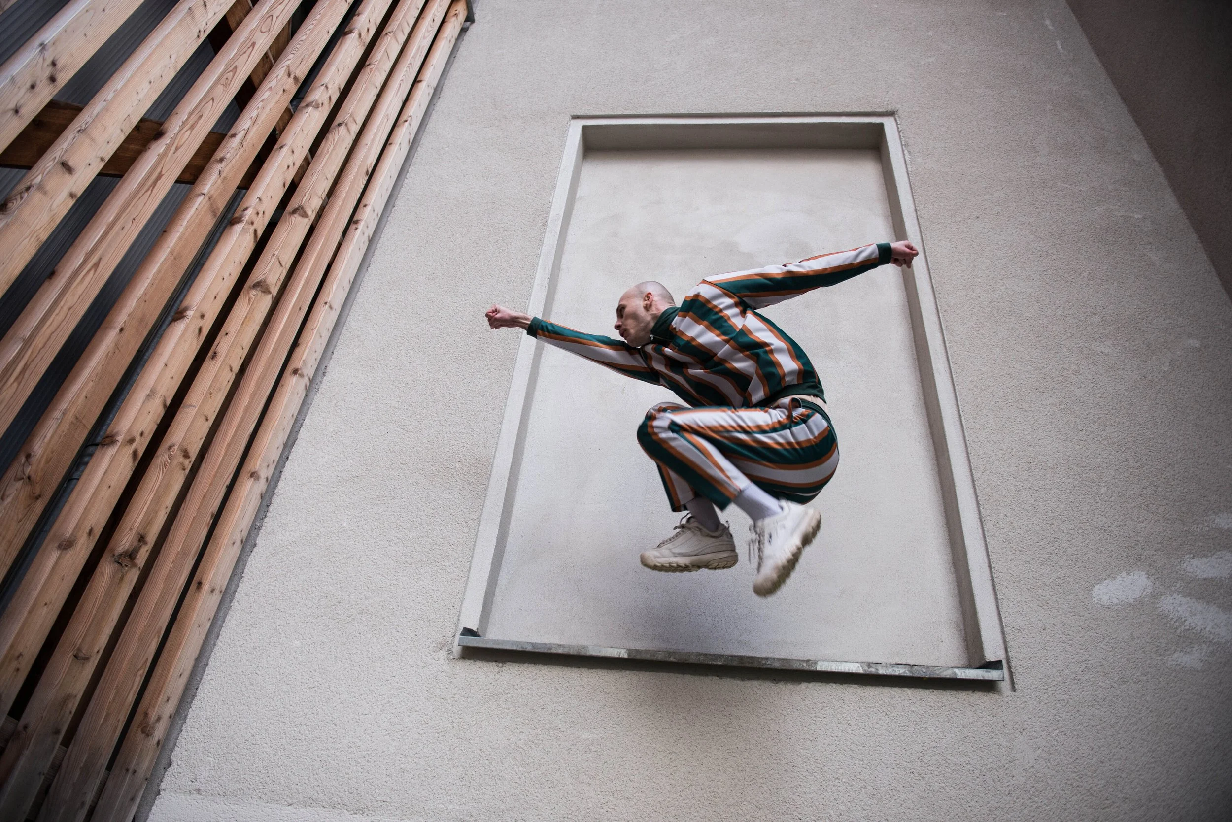 Solo Ten-Dance Performance Marcin Motyl jump up.jpg