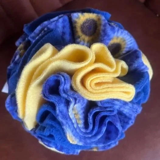 Snuffle ball for dogs, made out of bright coloured felt. Enrichment for dogs, boredom buster.