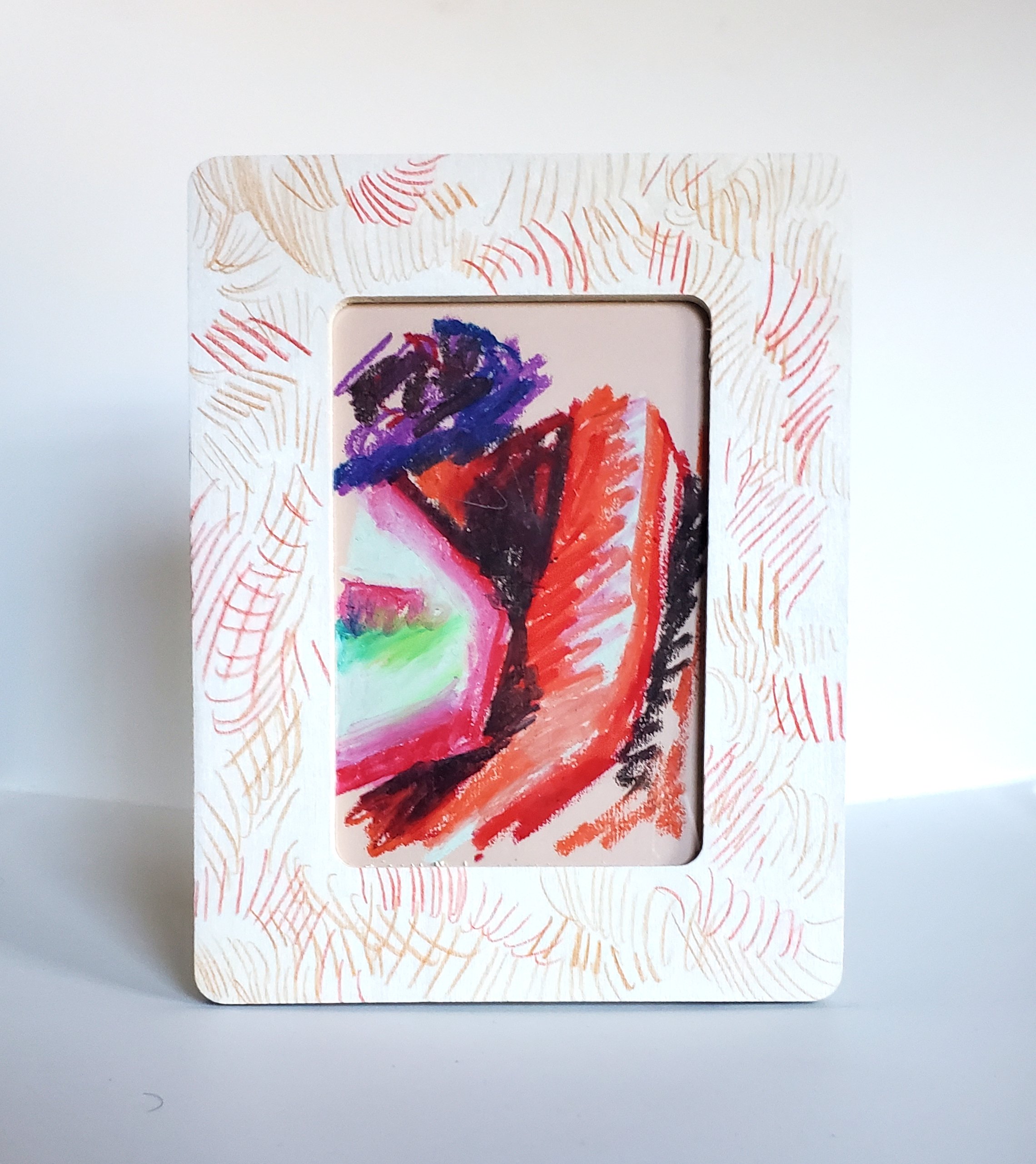 'In My Clothes Sketch 02' and accompanied custom frame, 2023.
Oil pastel on paper, color pencil on wood frame.
8 x 6 Inches.