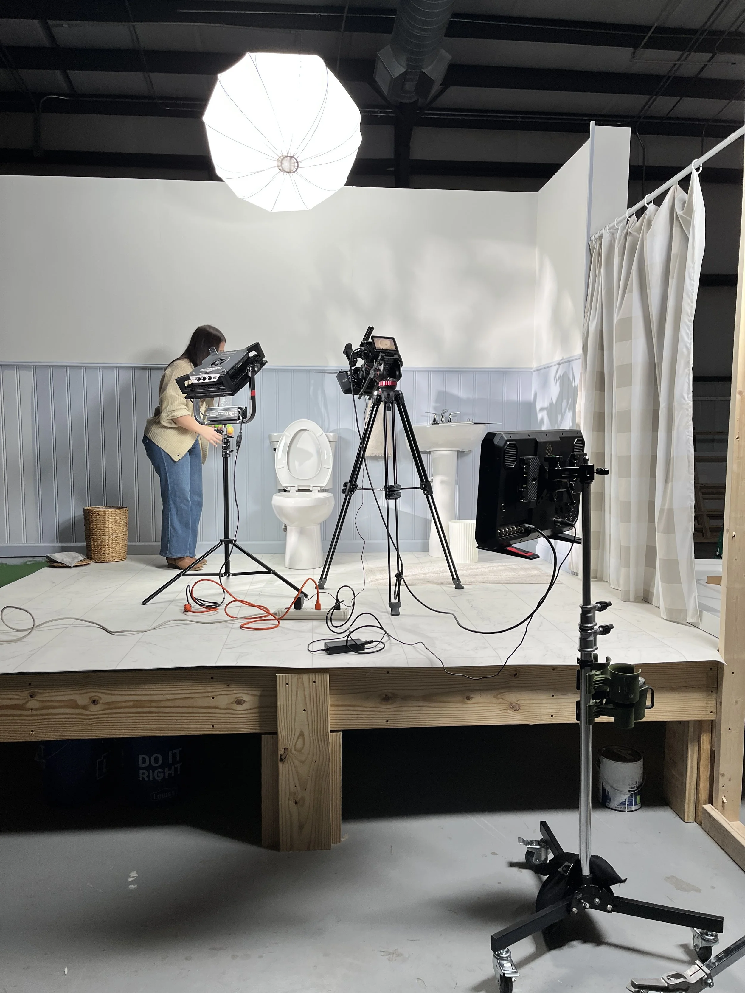 Tice Studios and Salt Paper Studio setting up a shot on set for Briggs Plumbing