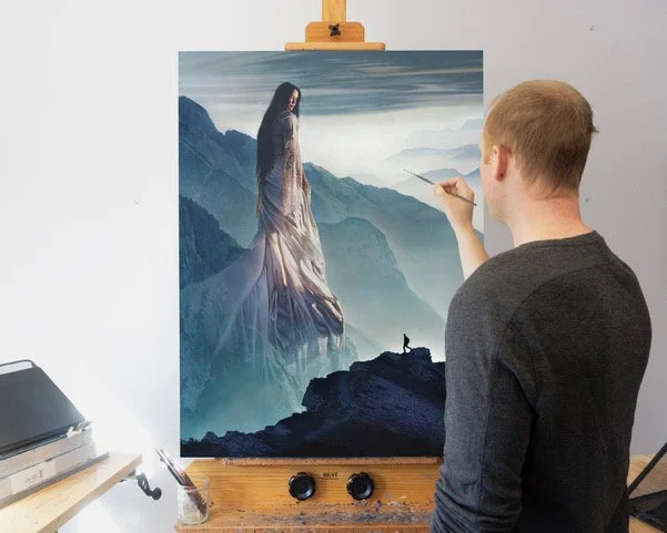 Austin Howlett working on his original painting, Time Remembers Us.