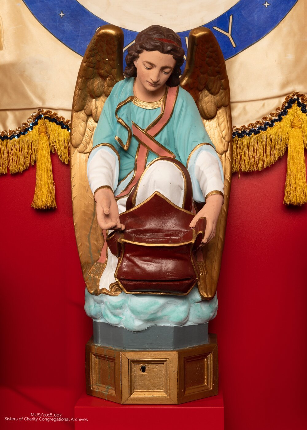  Angel statue with donation box, St Vincent's Hospital Toowoomba. Courtesy of the Congregational Archives of the Sisters of Charity of Australia 