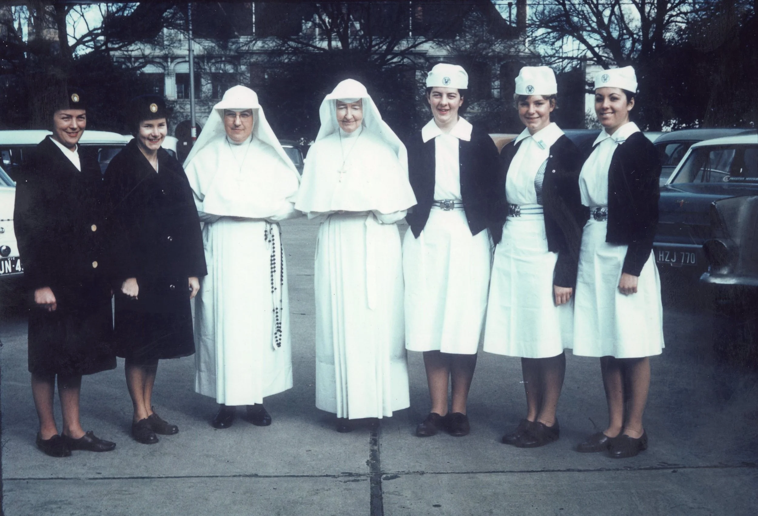 Catherine O’Connell and Francesca Healy rsc 1960s
Sr Catherine O'Connell (left), Sr Francesca Healy and Home Care nurses (at left trained nurses at right nurse trainees).
Image courtesy of St Vincent’s Hospital Melbourne Archives