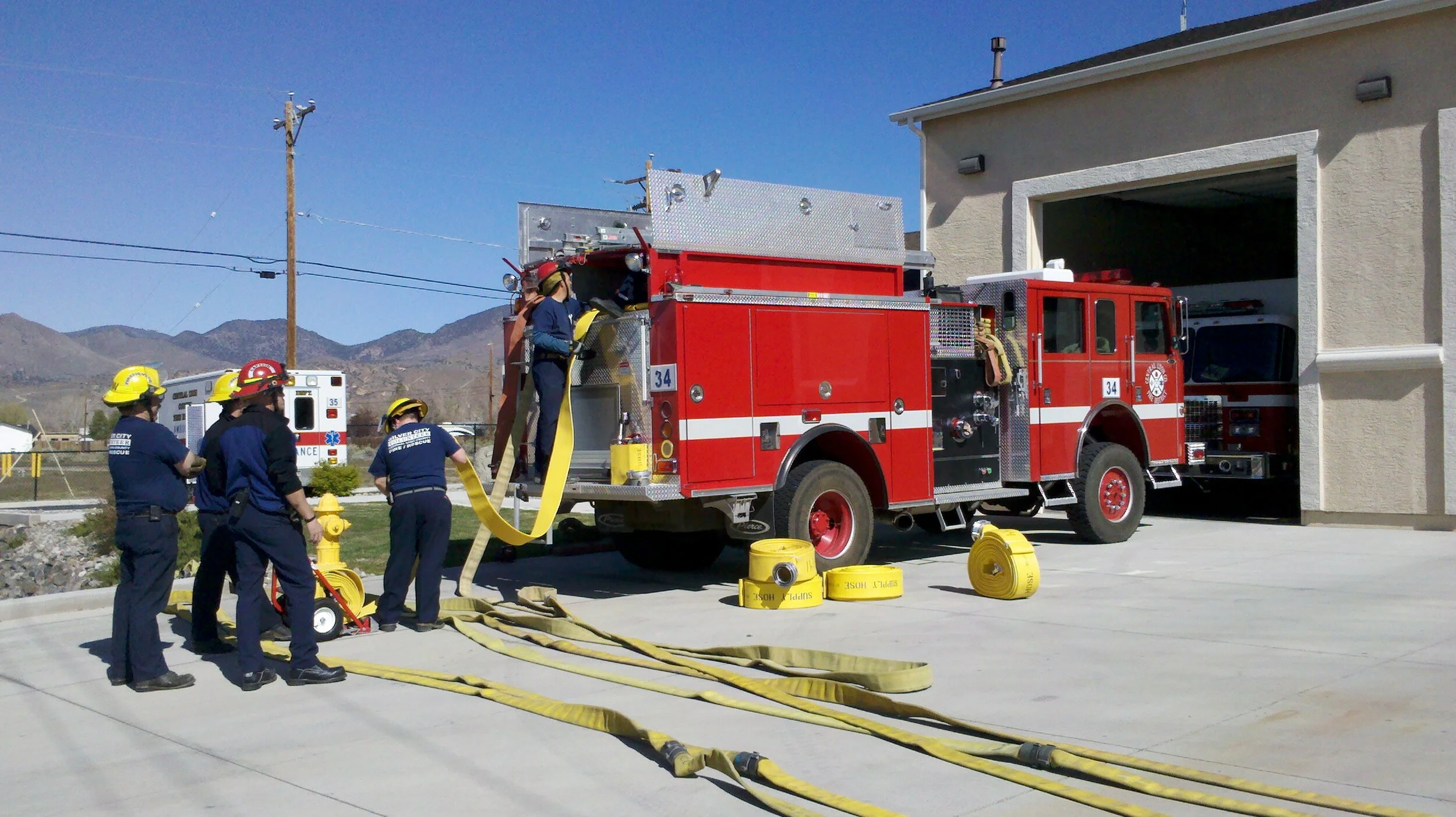 Engine 34 getting some new supply line, large diameter hose (LDH). 800 feet to be exact.