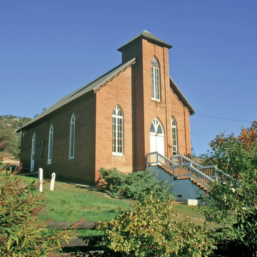 The Congregational Church at Copperopolis, California.
Built of brick in 1866, the lot upon which it stands was purchased the previous September from a Mr. J. M. Pike. The Reverend M. A. Starr assisted in raising the $12,000 needed for the constructi