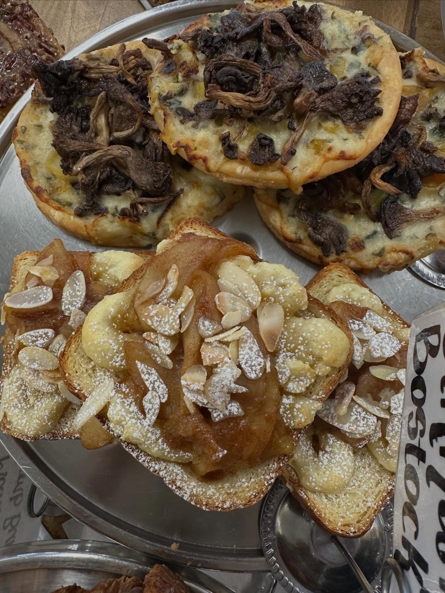 New pastry item alert! Apple cinnamon and almond Bostock. A cross between an almond croissant and French toast. Ours has lemony almond frangipane, apple cinnamon compote, and toasted almonds. Get it warmed up and it&rsquo;s a perfect breakfast treat!