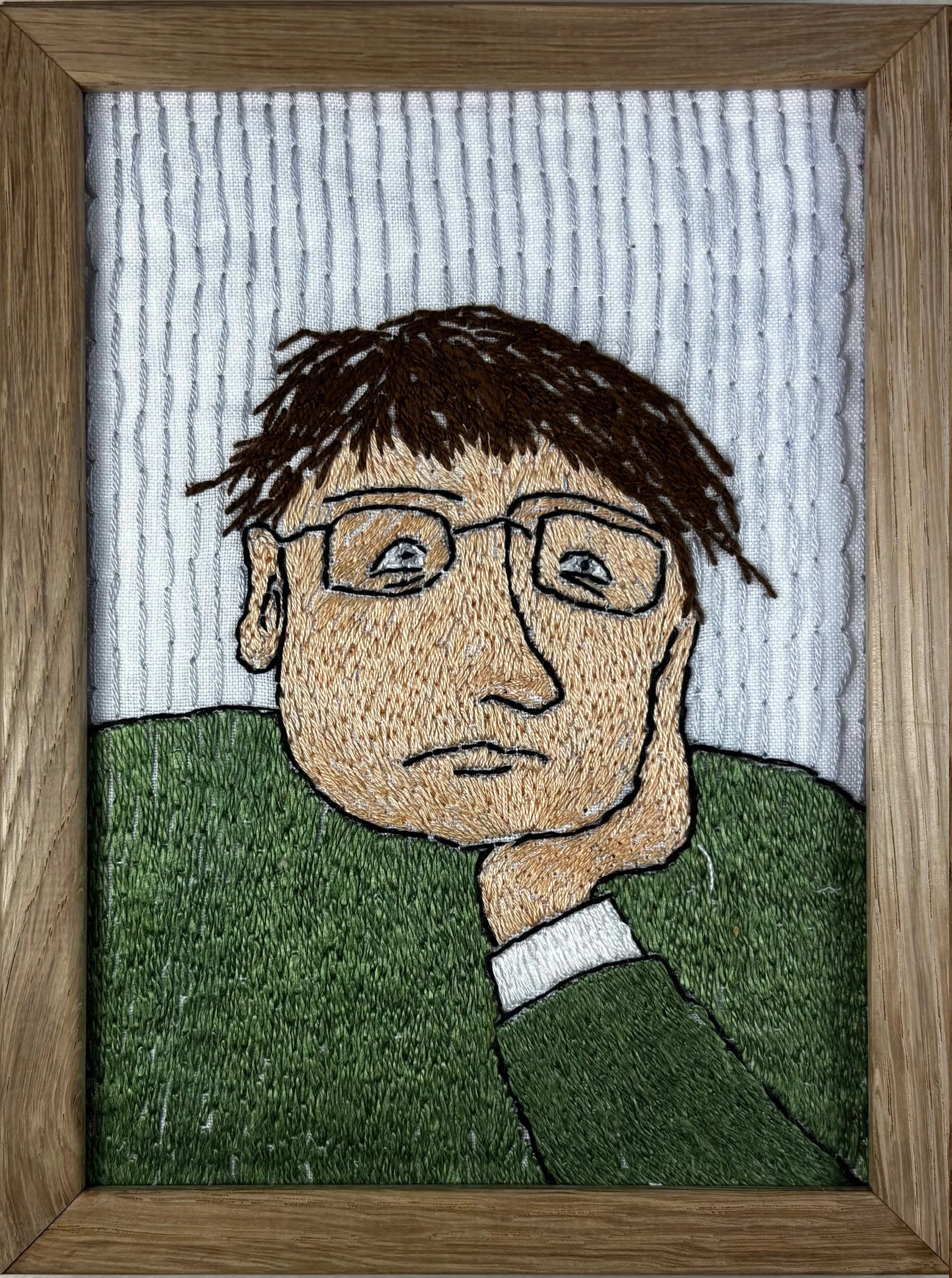 "Portrett 2". Broderi på lin i treramme, 13x18cm.
 Solgt