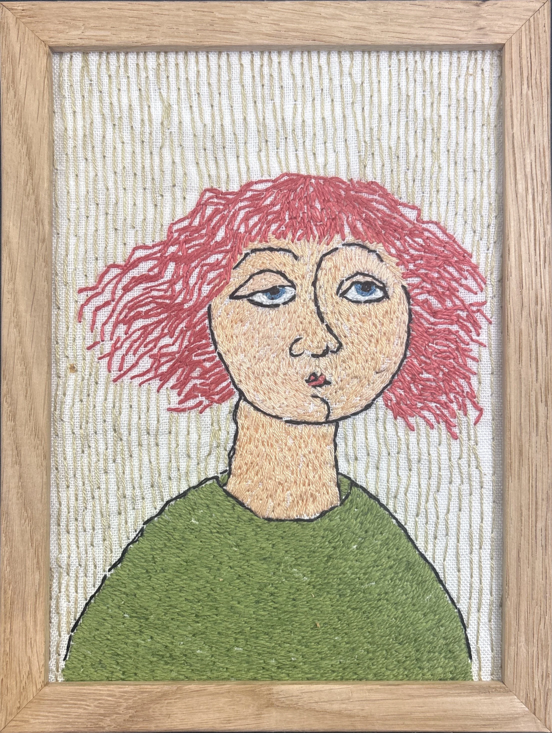 "Portrett kvinne 2", broderi på lin i treramme. 13x18cm, kr.1800