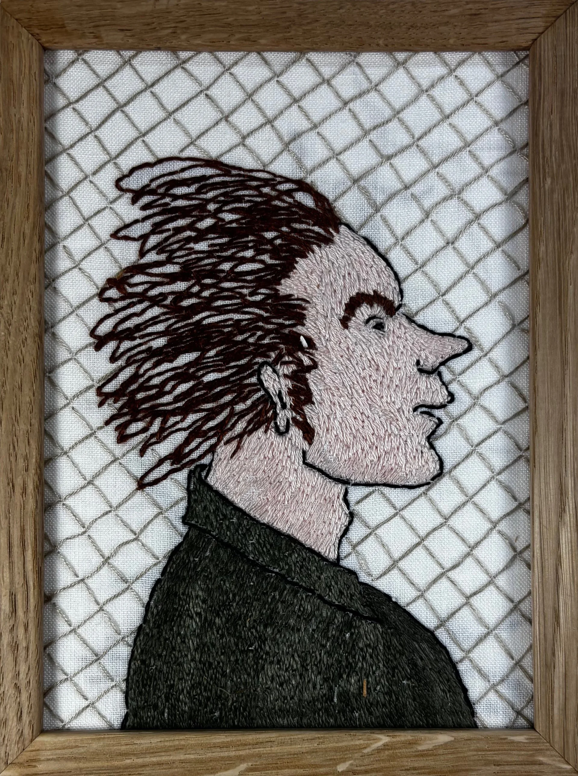 "Portrett 1". Broderi på lin i treramme, 13x18cm.
Kr. 1800