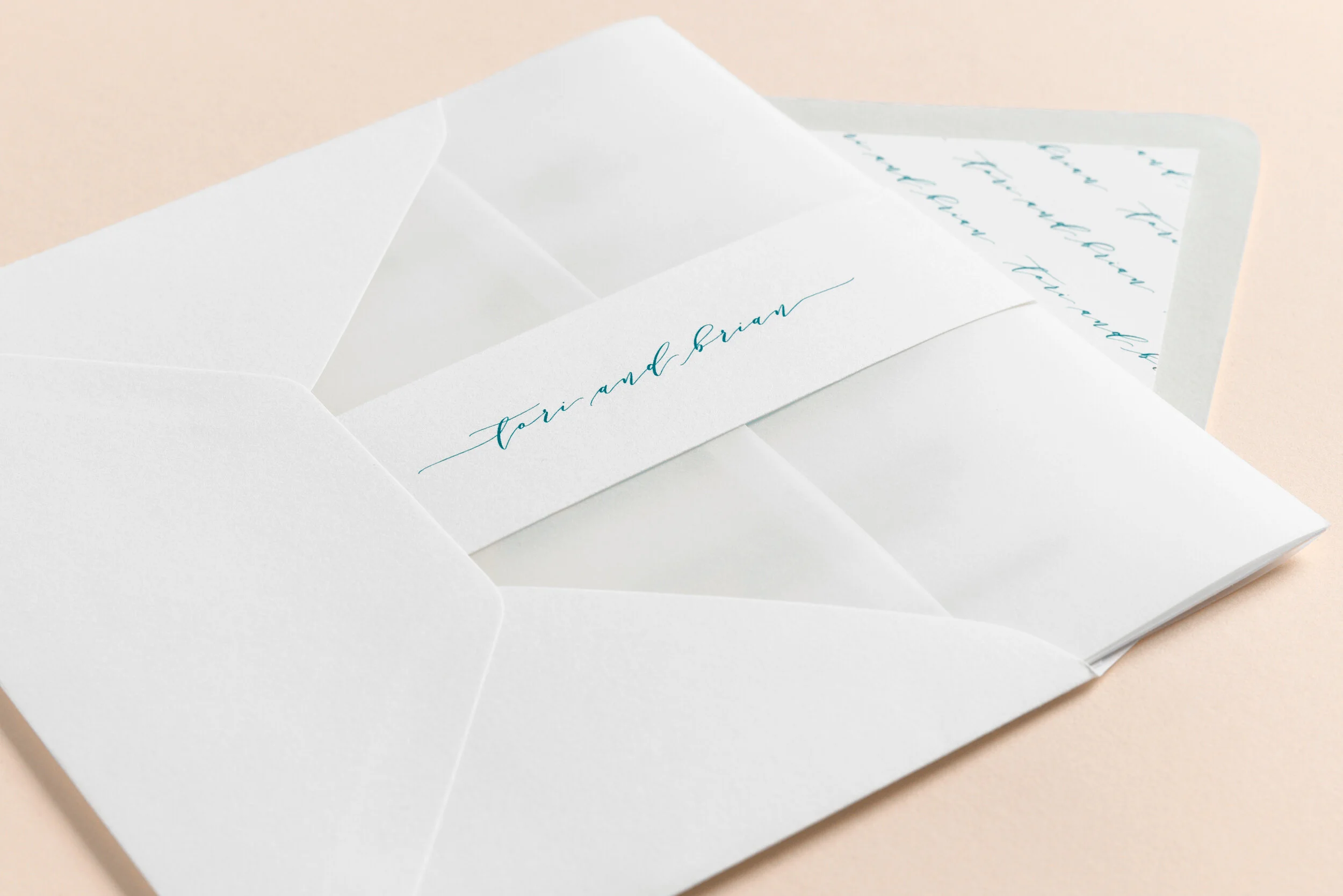 Tori save the date in envelope perspective.jpg