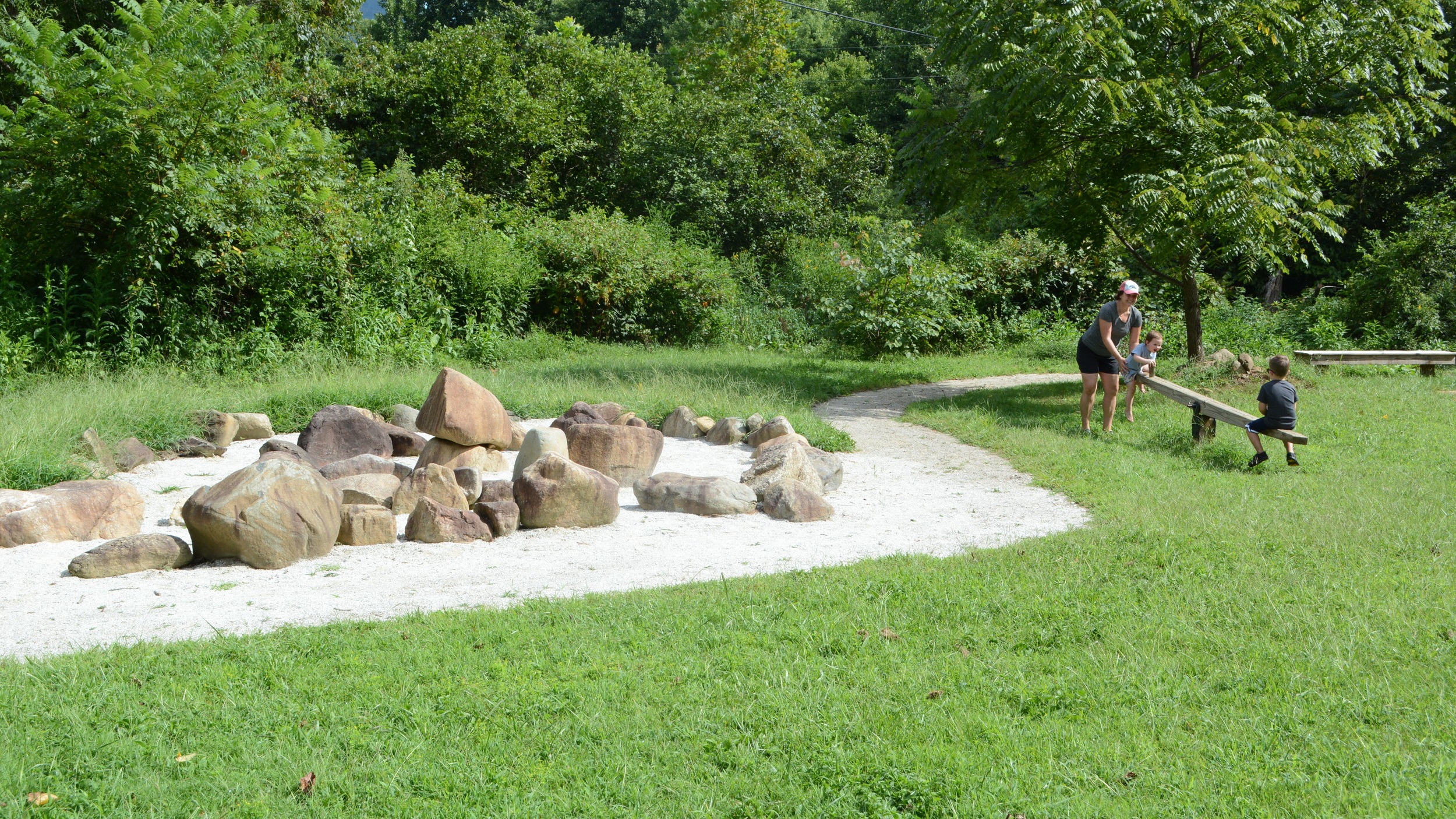 Rocks to climb on and a classic seesaw.