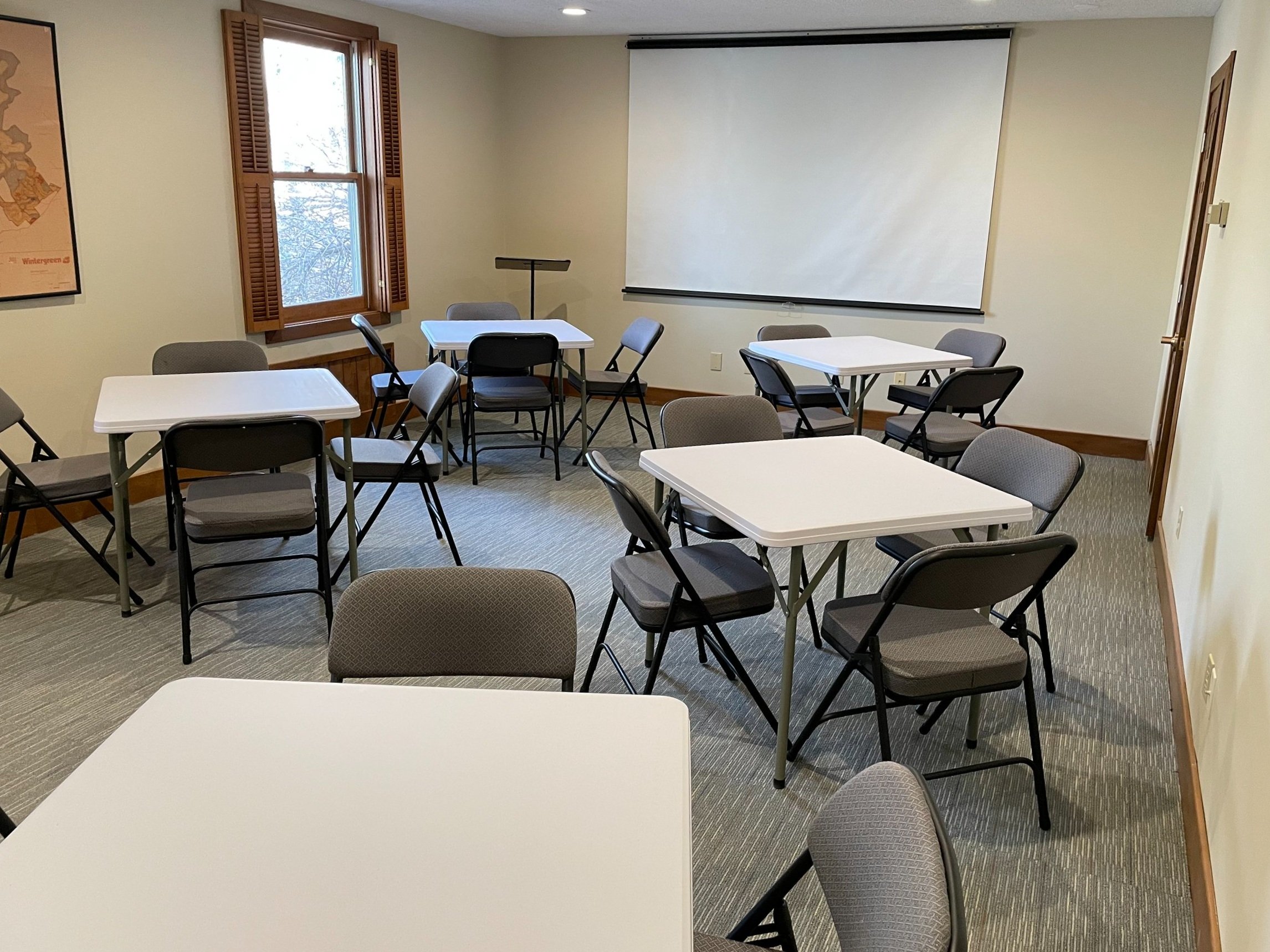   Seating for approximately 24, LCD projector, podium, and a mix of card tables and 6 foot tables depending on your needs.  