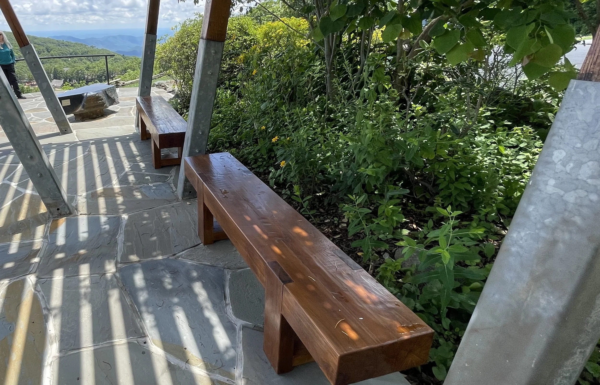   WPOA built wooden benches of Black Locus for the pavilion to complement the overhead structure.  