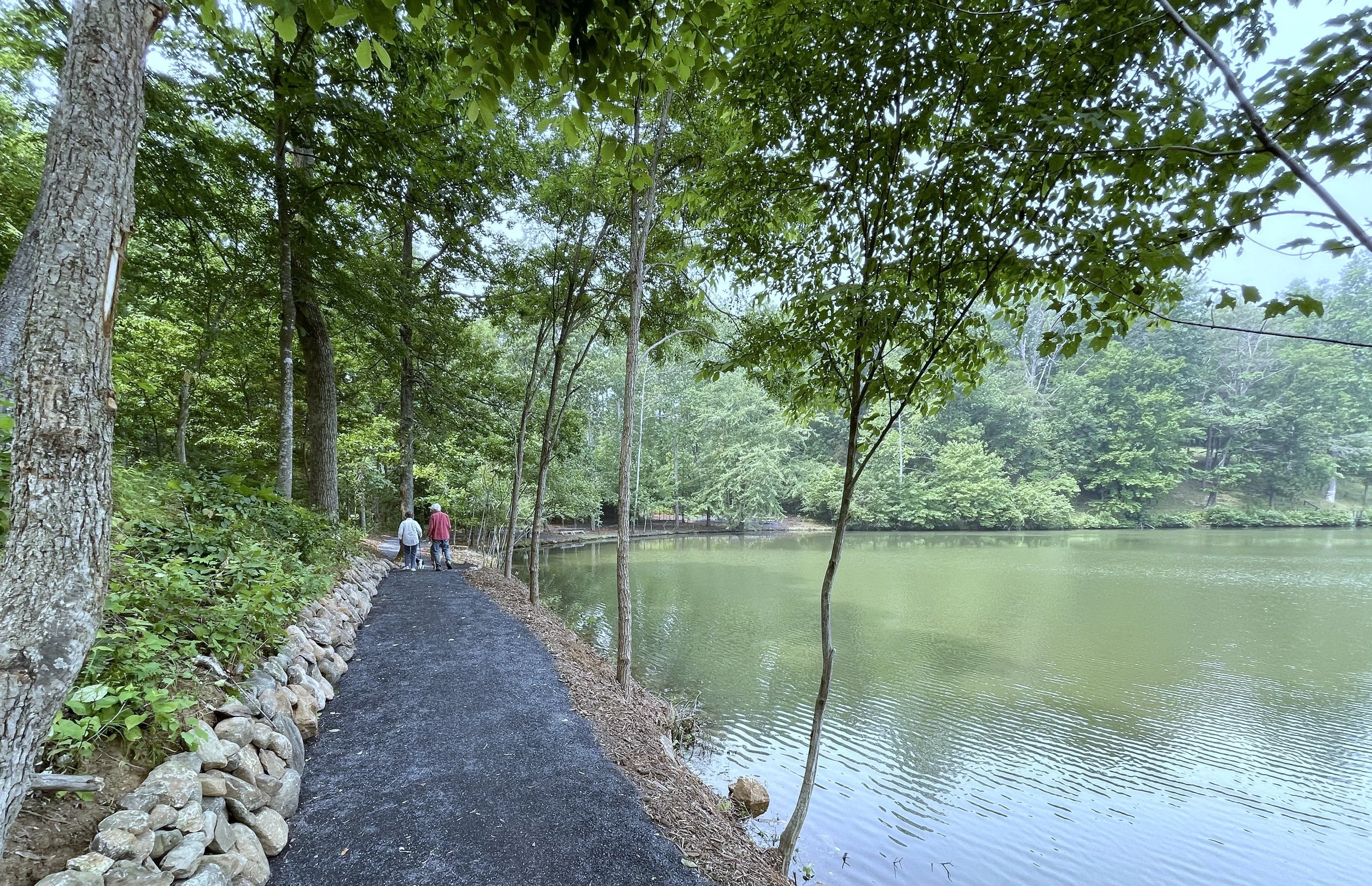 Long Pond Path-couple with dog, rock landscaping copy.jpeg