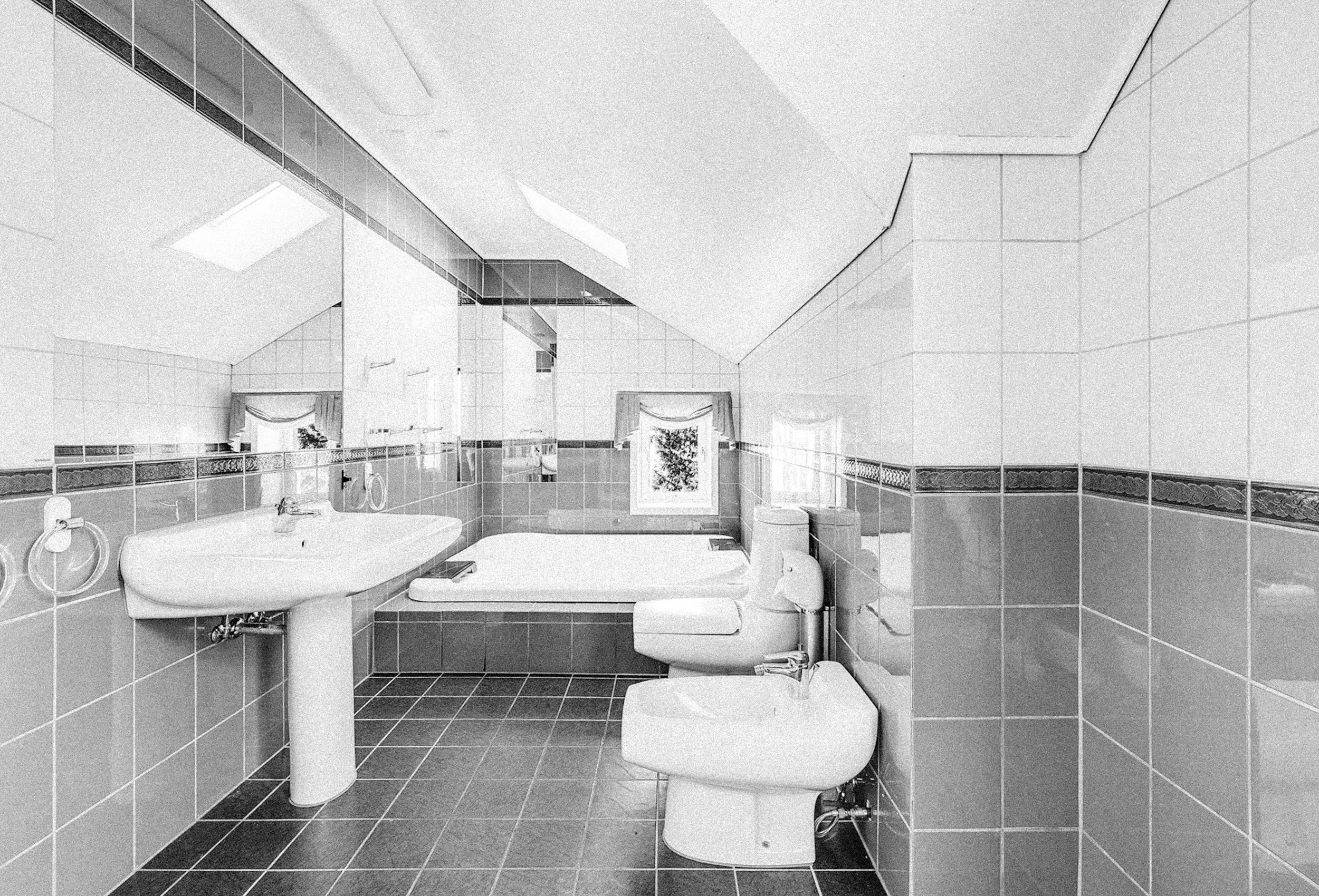Svart hvitt foto av Geitmyrsveien før renovering