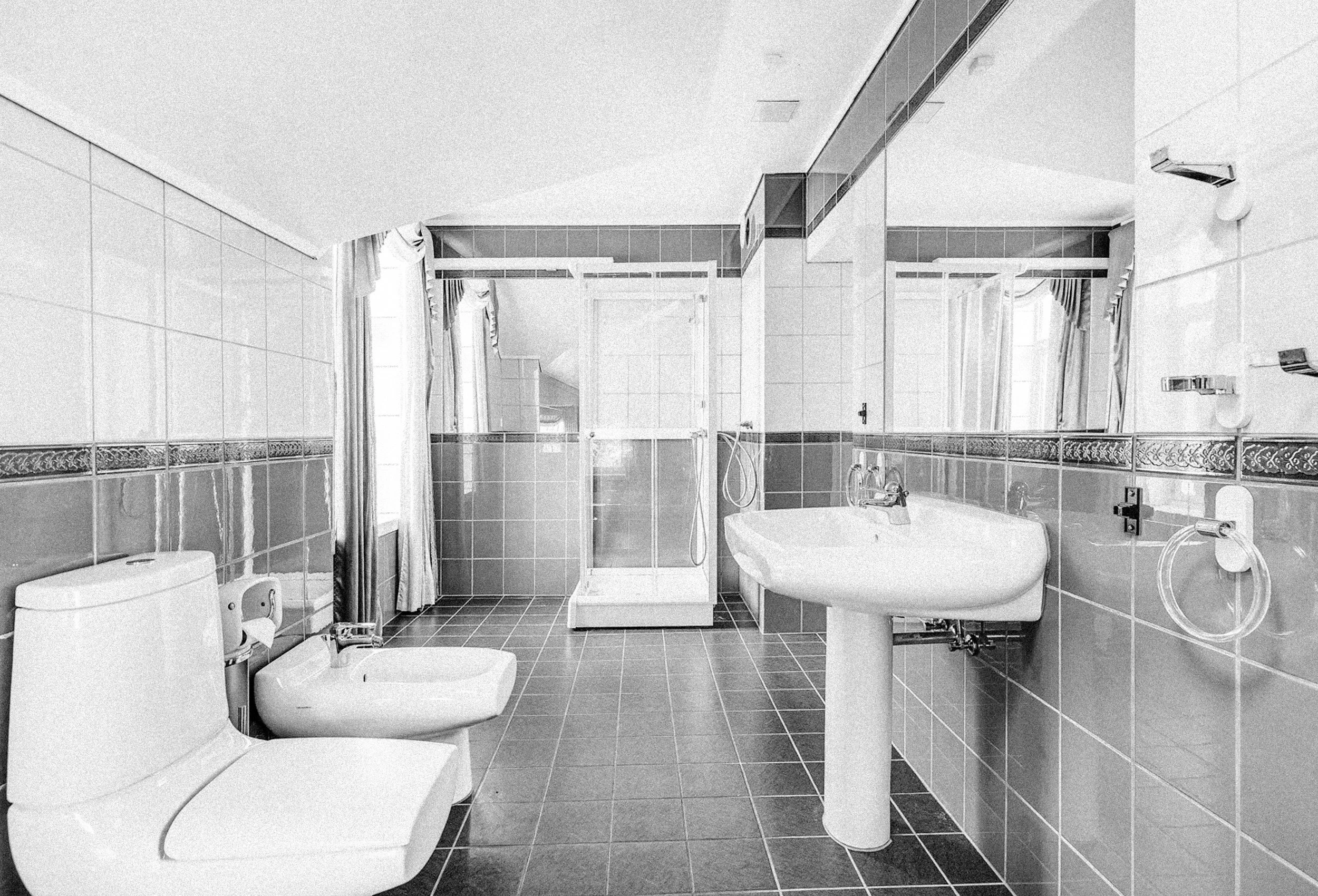 Svart hvitt foto av Geitmyrsveien før renovering