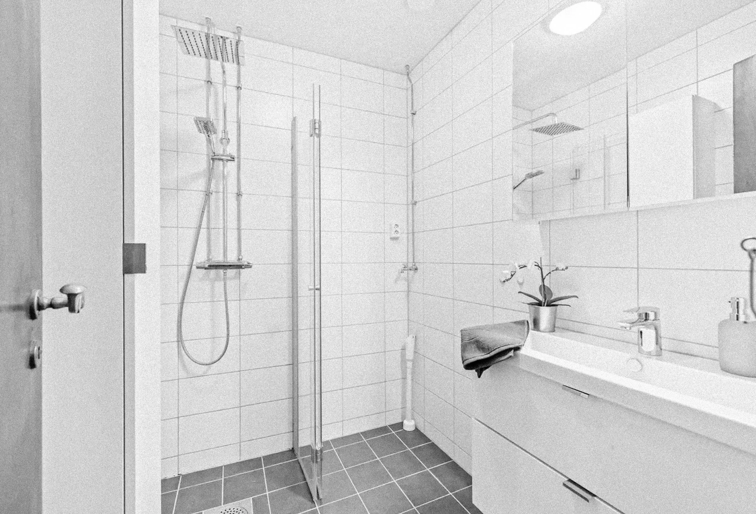 Svart hvitt foto av Harald Hårfagres gate før renovering