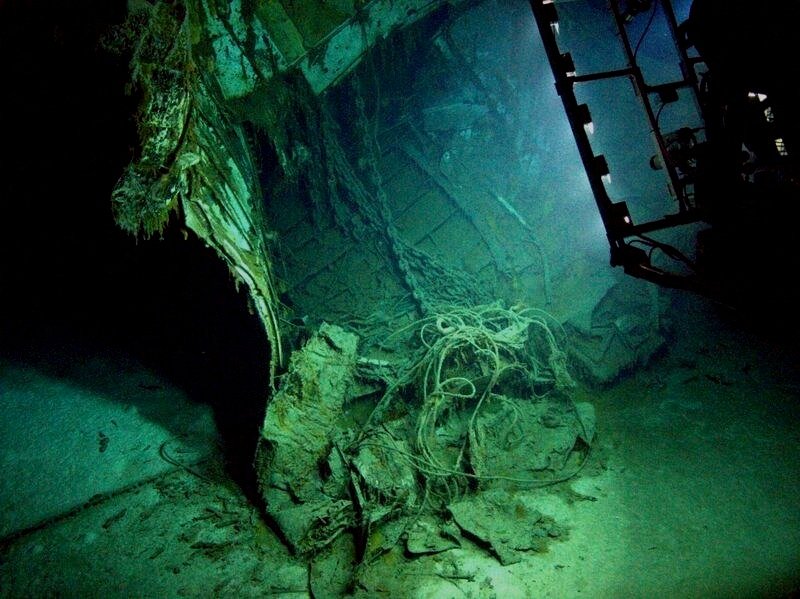 rov surveying shipwreck on sea floor