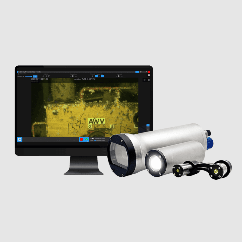 single channel inspection equipment package, subc cameras and lasers next to computer displaying underwater footage