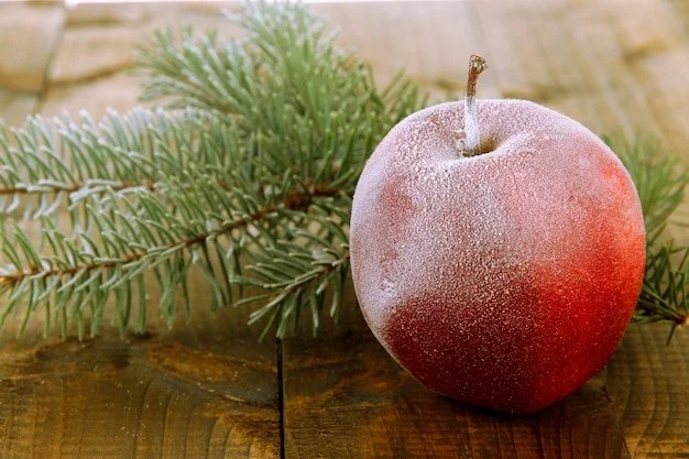 red-frosted-apple-with-fir-branch-wooden-table_392895-18040.jpg