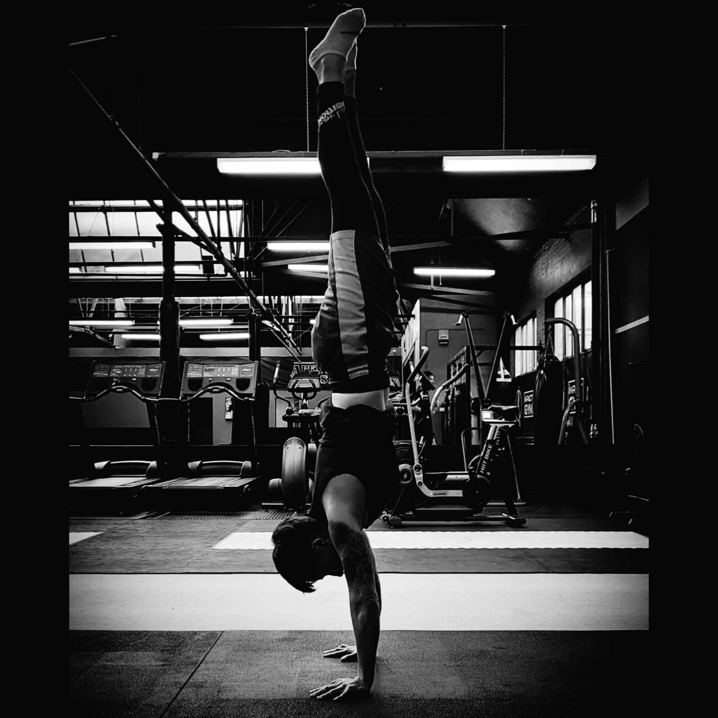 Photo of Mel holding a handstand