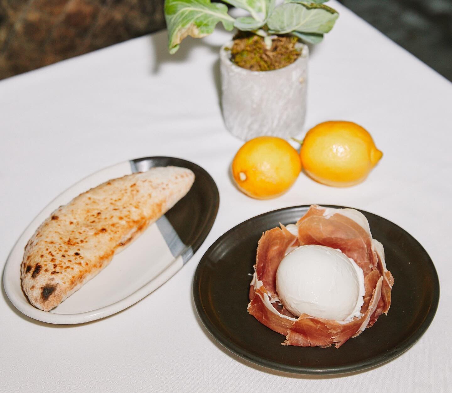 Amalfi inspiration is all about the cuisine and the taste.
PROSCIUTTO &amp; BURRATA: One of our most requested appetizers on the Conca menu. The prosciutto san daniele is paired with soft and creamy burrata and served with wood oven baked bread. The 