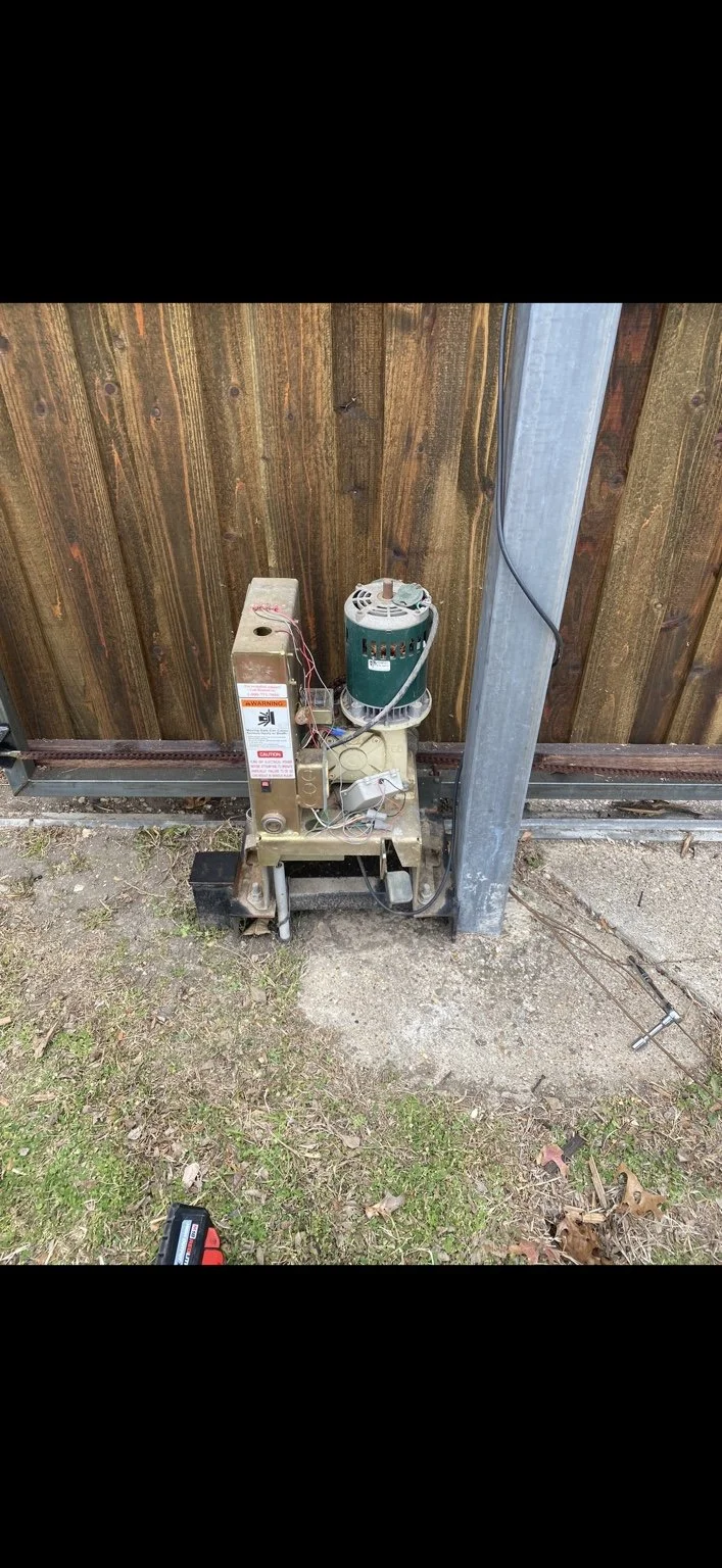 BEFORE — Carrollton, Texas. Existing Ramset gate operator with the green motor, shown with its cover removed.