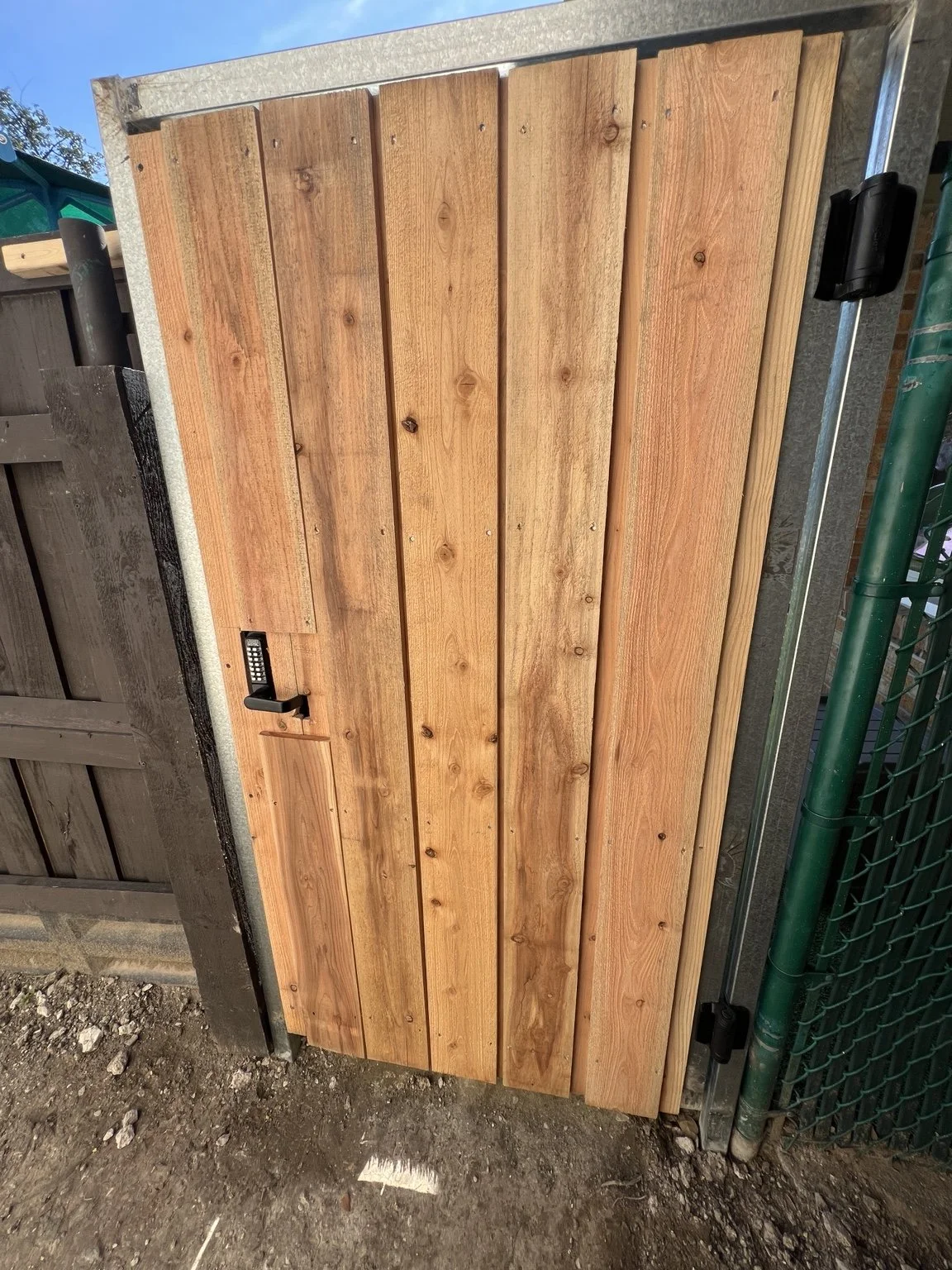 School pedestrian gate with a mechanical push-button keyless lock installed by Duncan’s Services