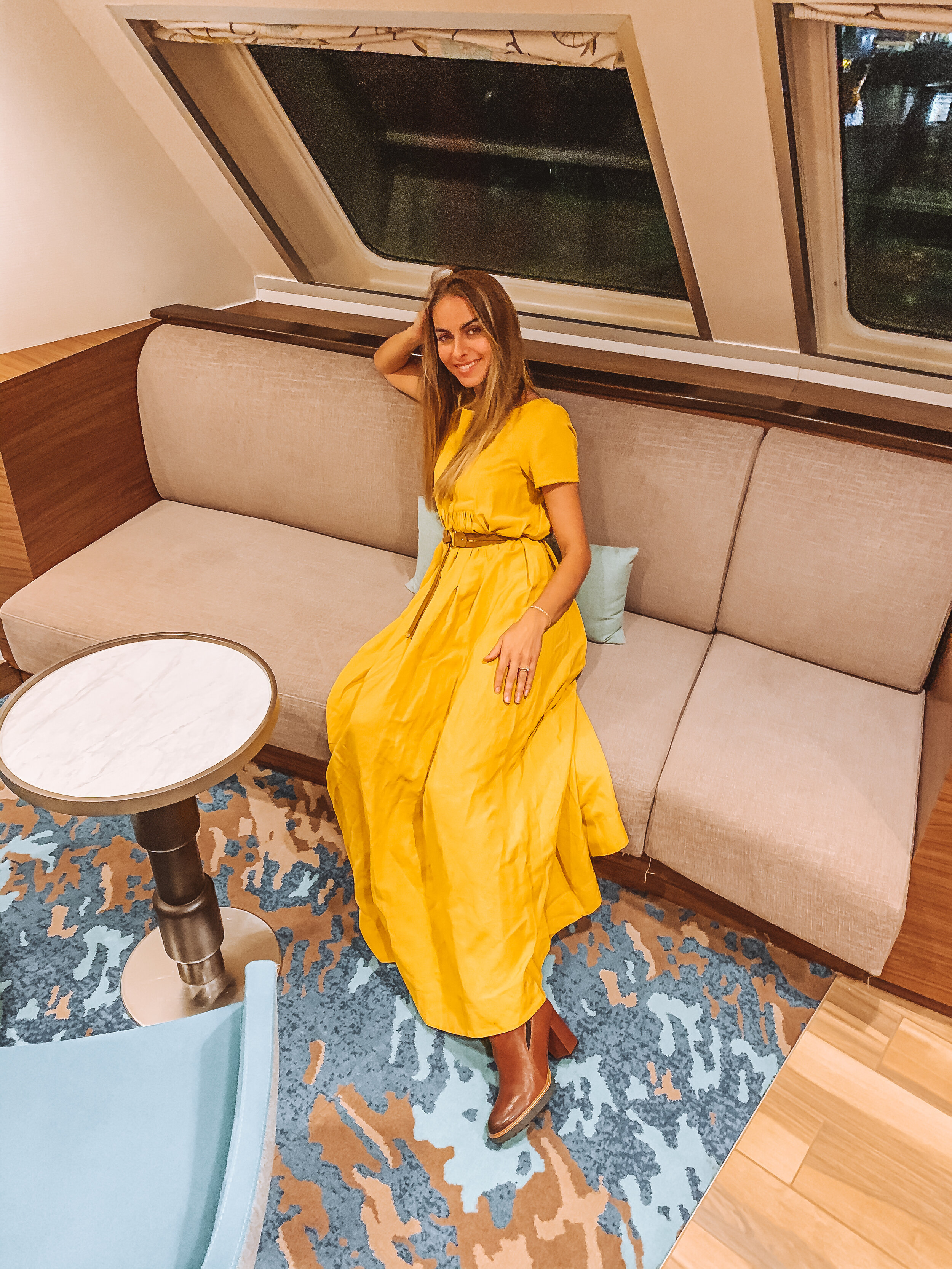 tasha-courtney-cruise-ship-lounge-yellow-dress.jpg