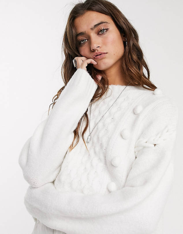 $15.95 Bershka pom pom knitted sweater in cream - ASOS