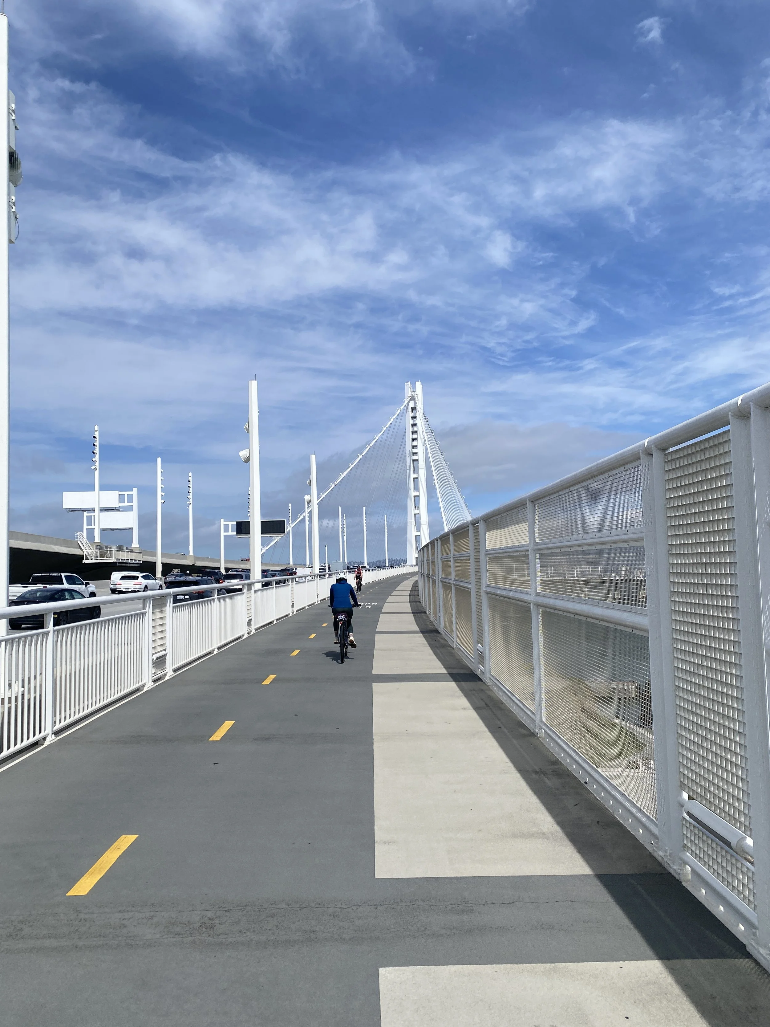 Cyclist traveling along the San Francisco–Oakland Bay Bridge pathway.