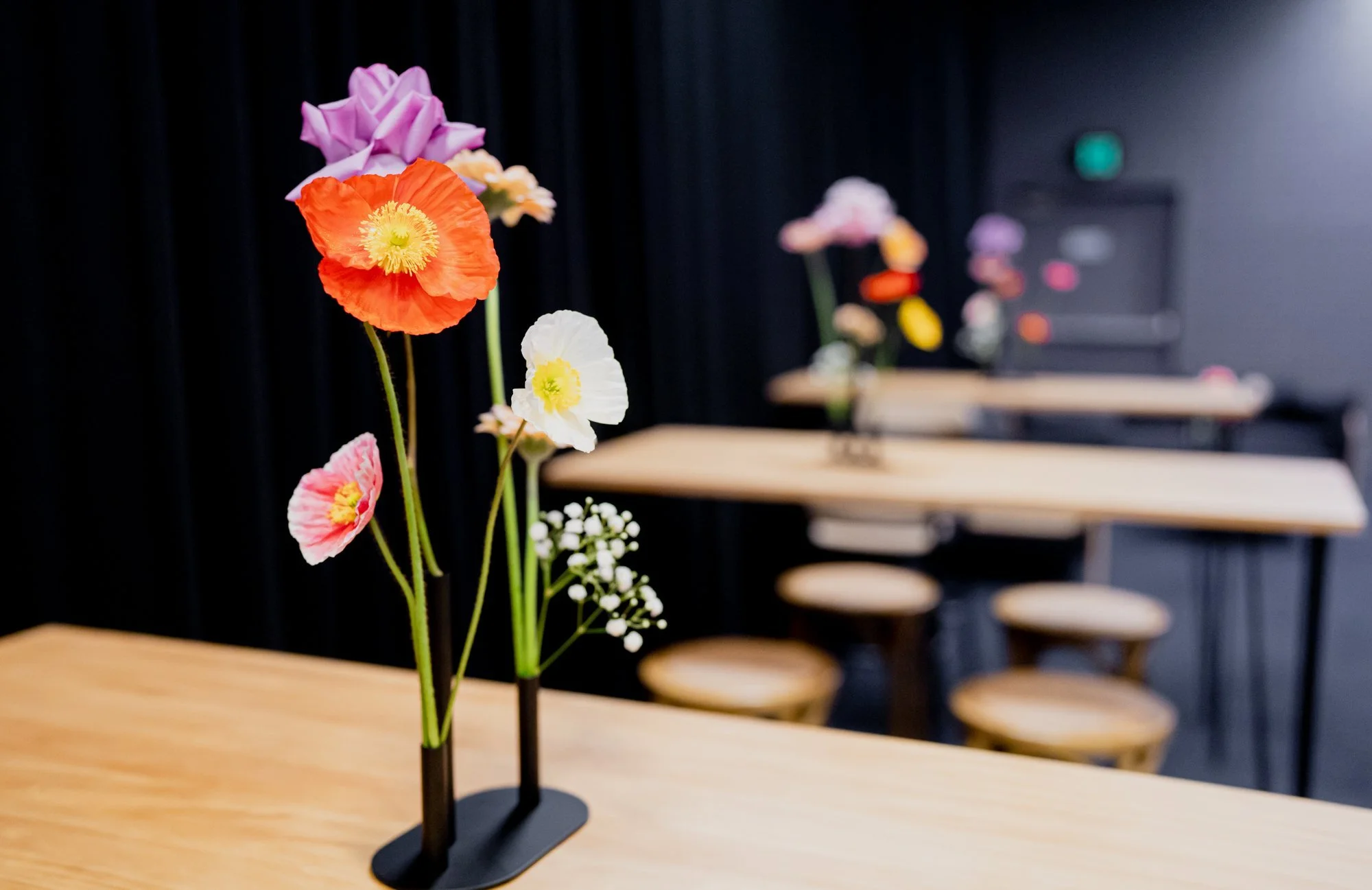 Natural timber hairpin bar tables with black metal hairpin legs available for hire in Sydney and NSW, ideal for weddings, corporate events, and private functions.