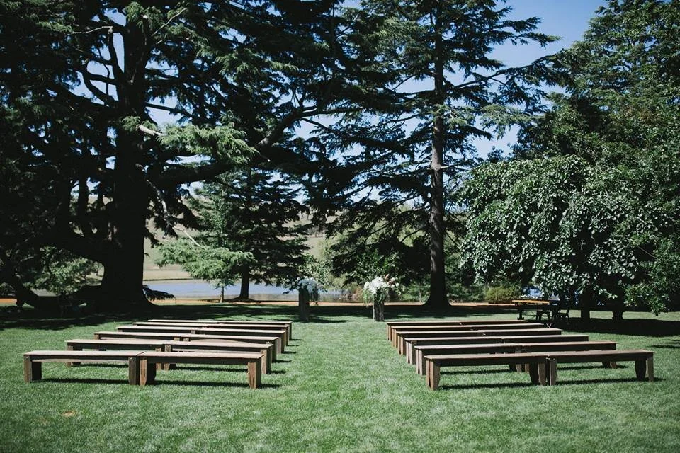 Rustic timber benches available for hire in Sydney and NSW, ideal for weddings, corporate events, and private functions.