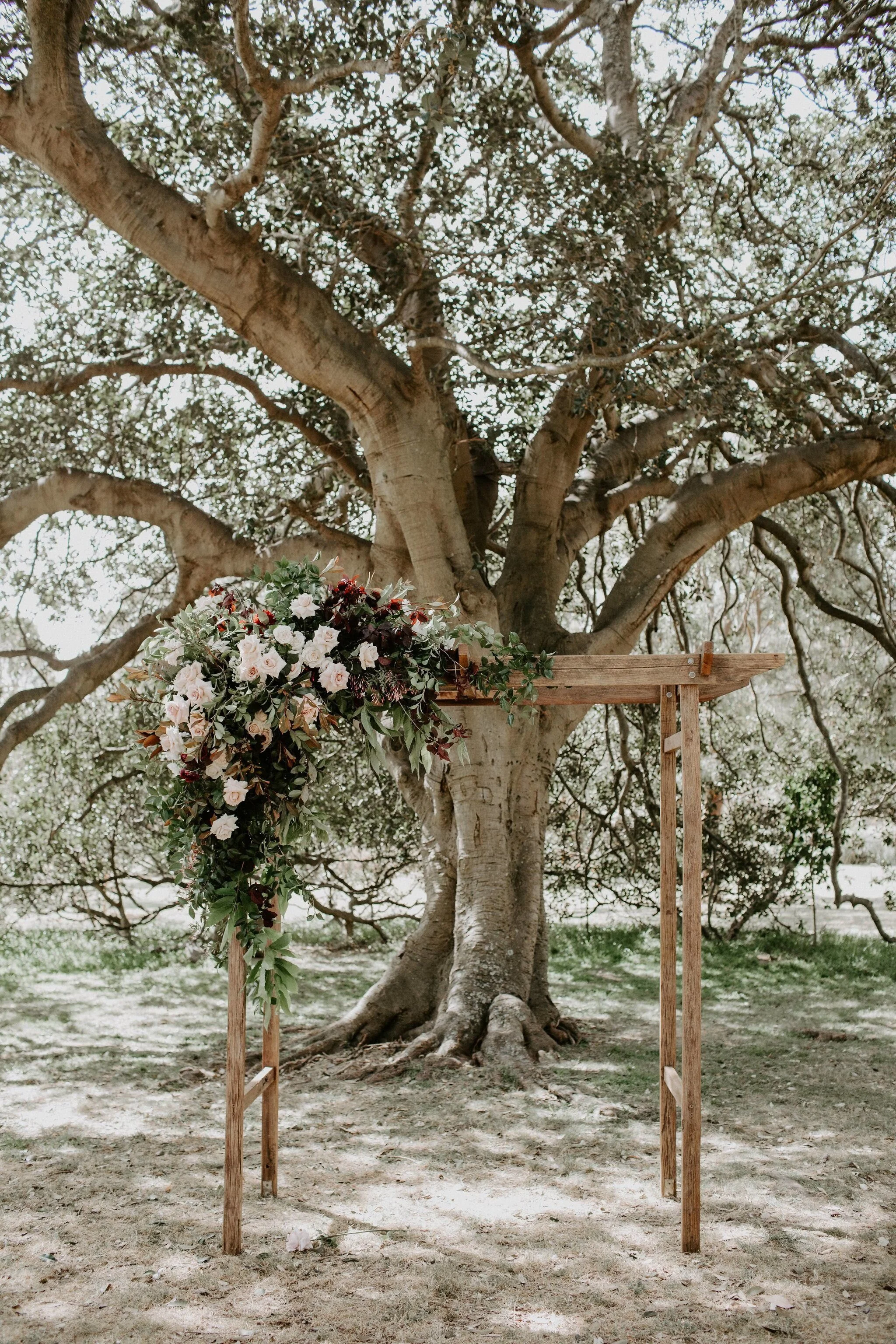 Timber wedding arch available for hire in Sydney and NSW, ideal for outdoor wedding ceremonies and bridal entrances.