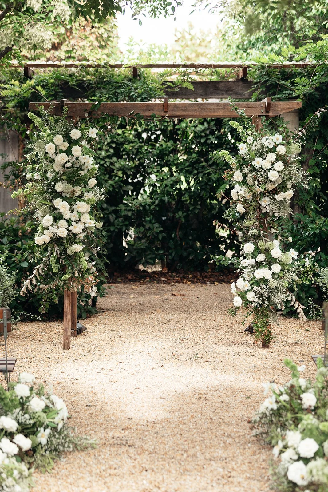 Timber wedding arch available for hire in Sydney and NSW, ideal for outdoor wedding ceremonies and bridal entrances.