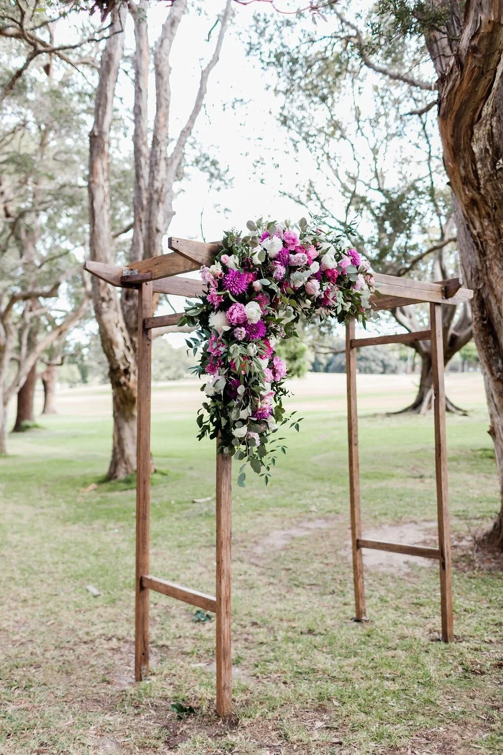 Timber wedding arch available for hire in Sydney and NSW, ideal for outdoor wedding ceremonies and bridal entrances.