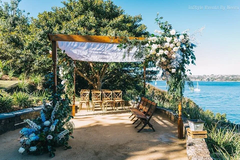 Hand-carved wooden mandap with turned timber legs available for hire in Sydney and NSW, ideal for Hindu, Jewish, and traditional wedding ceremonies.