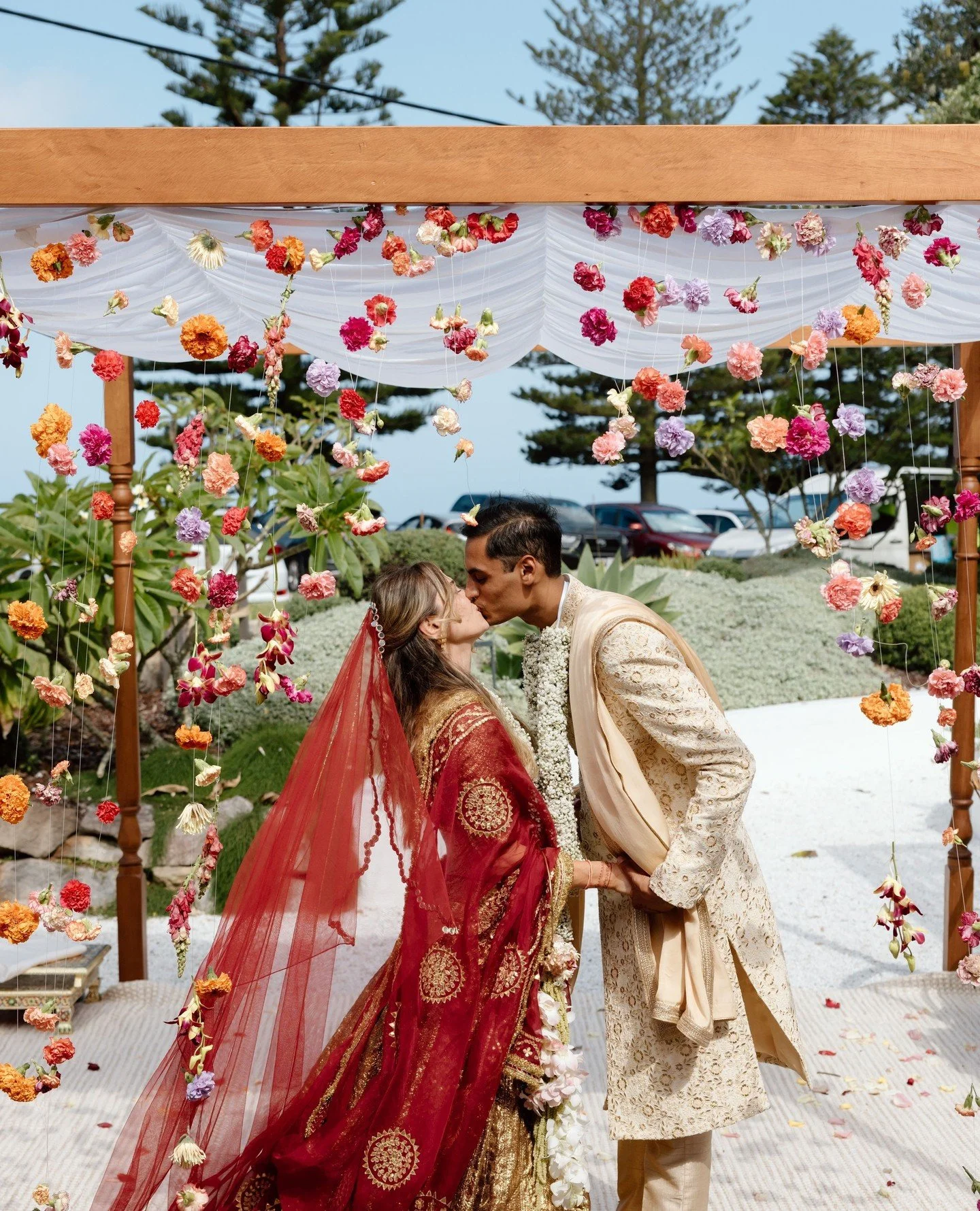 A ceremony moment set beneath our Mandap at @dunespalmbeach ✨️⁠
⁠
Framed with those beautiful, soft garlands and natural textures from the timber, designed to sit comfortably within the coastal setting and let the focus remain where it should be!⁠
⁠
