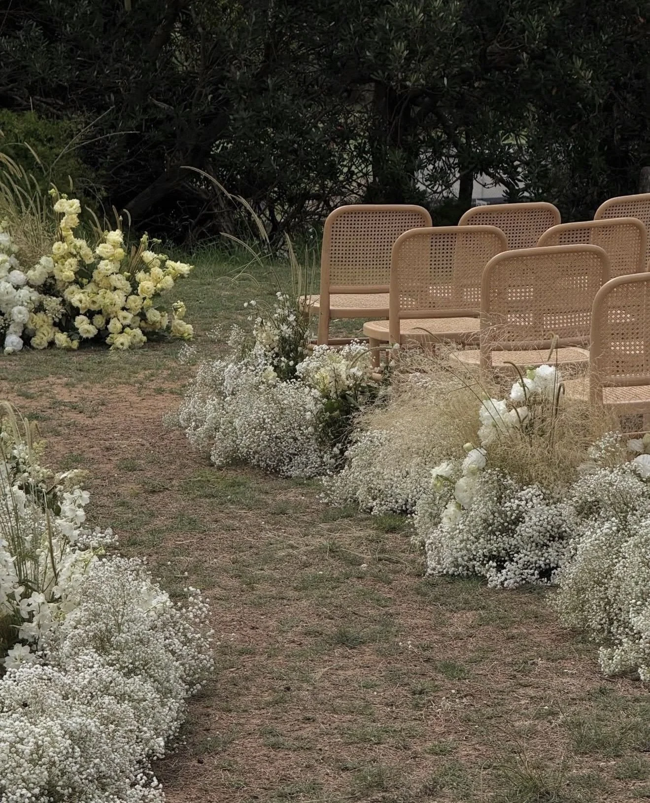Aisle of dreams with  our Natural Rattan Dining Chairs 😍⁠
⁠
@petalbang ⁠
@loverslaneweddingsandevents⁠
@dunesweddings⁠
⁠
#eventfurniturehiresydney #sydneyeventhire #sydneyevents #eventhire #corporateeventsydney #weddinghiresydney