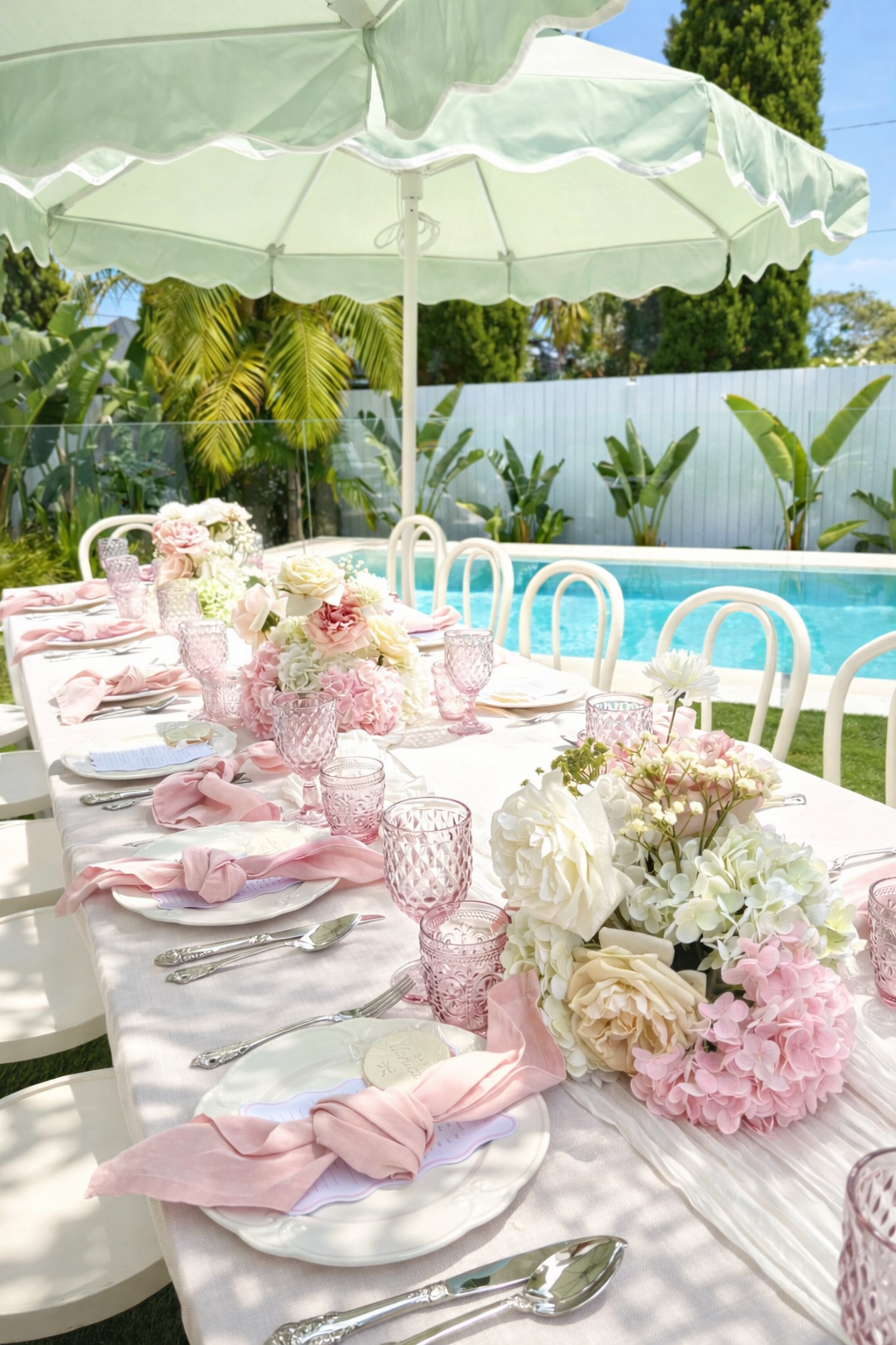 Baby shower set up with HYRE EVENTS styling elevents and gorgeous sage umbrellas