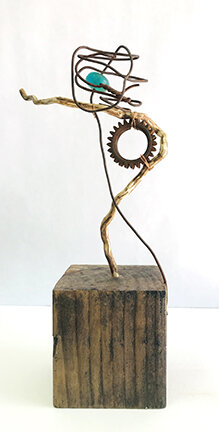 REPURPOSED lll, enamel, glaze, wood, found objects: steel, plastic, 3.5wx10hx4d inches, SOLD