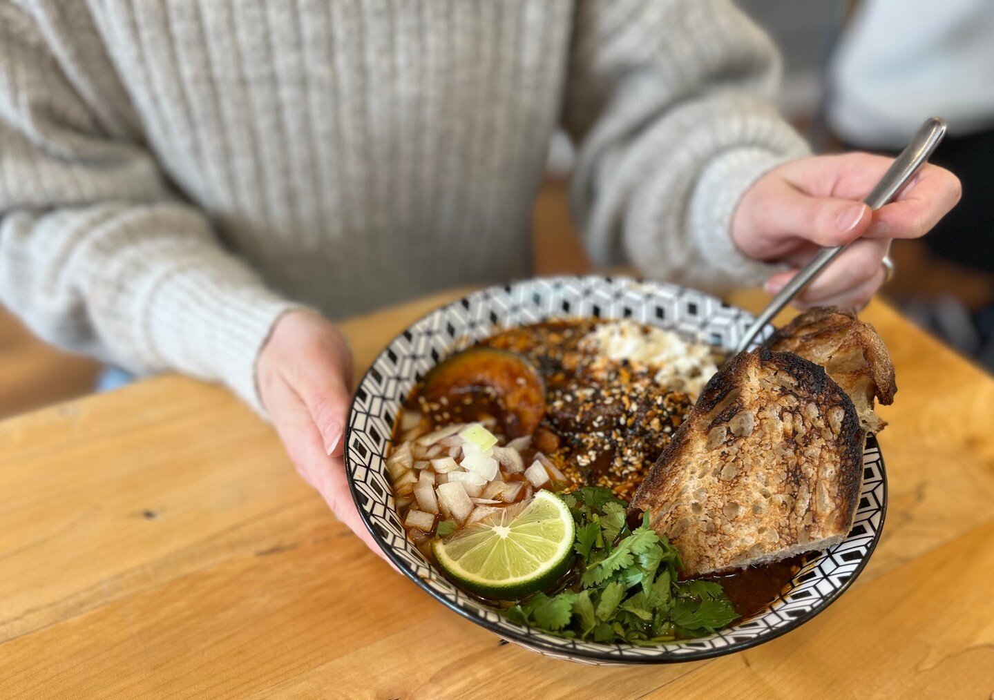 Unfortunately, we couldn't take a vacation this year, so instead, we're bringing Mexico to you with Beef Birria.

Braised beef and roasted pumpkin in a rich and spicy adobo, topped with cilantro, lime, salsa macha, queso fresco, and sourdough for dip