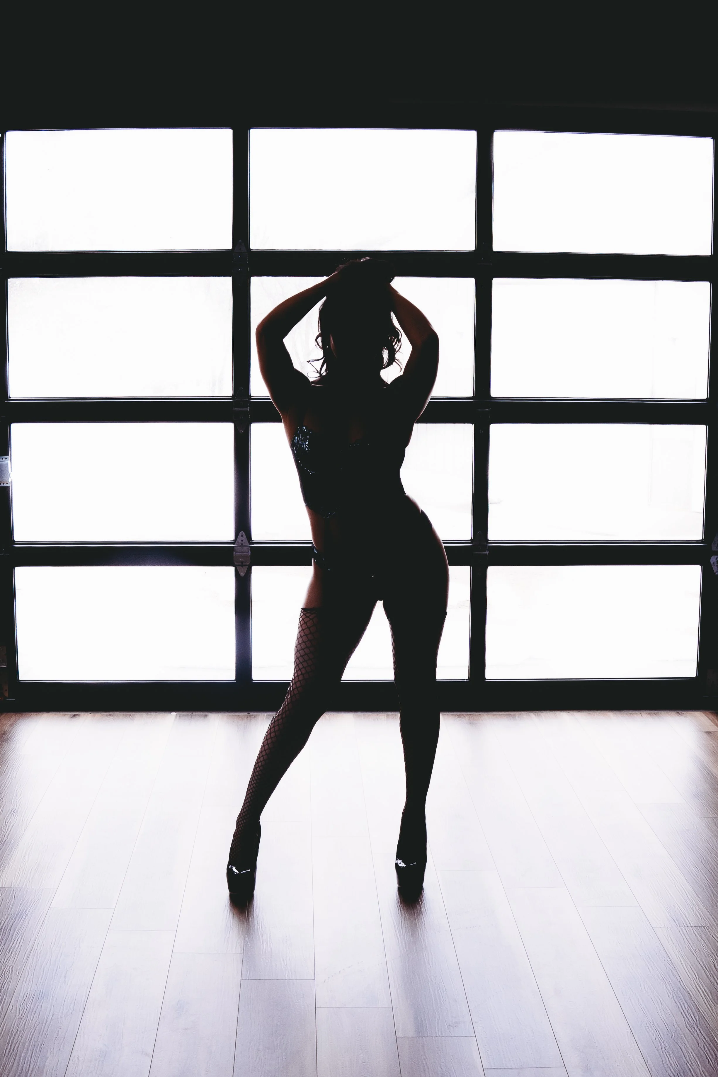 Princeton MN boudoir photographer Sheri Hiller capturing bold, empowering portraits that celebrate self-love and body confidence.