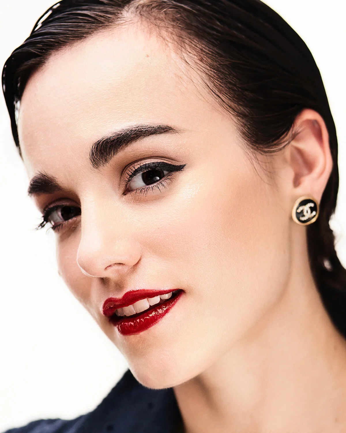 classic red lipstick black eyeliner makeup for photoshoot and video shoot