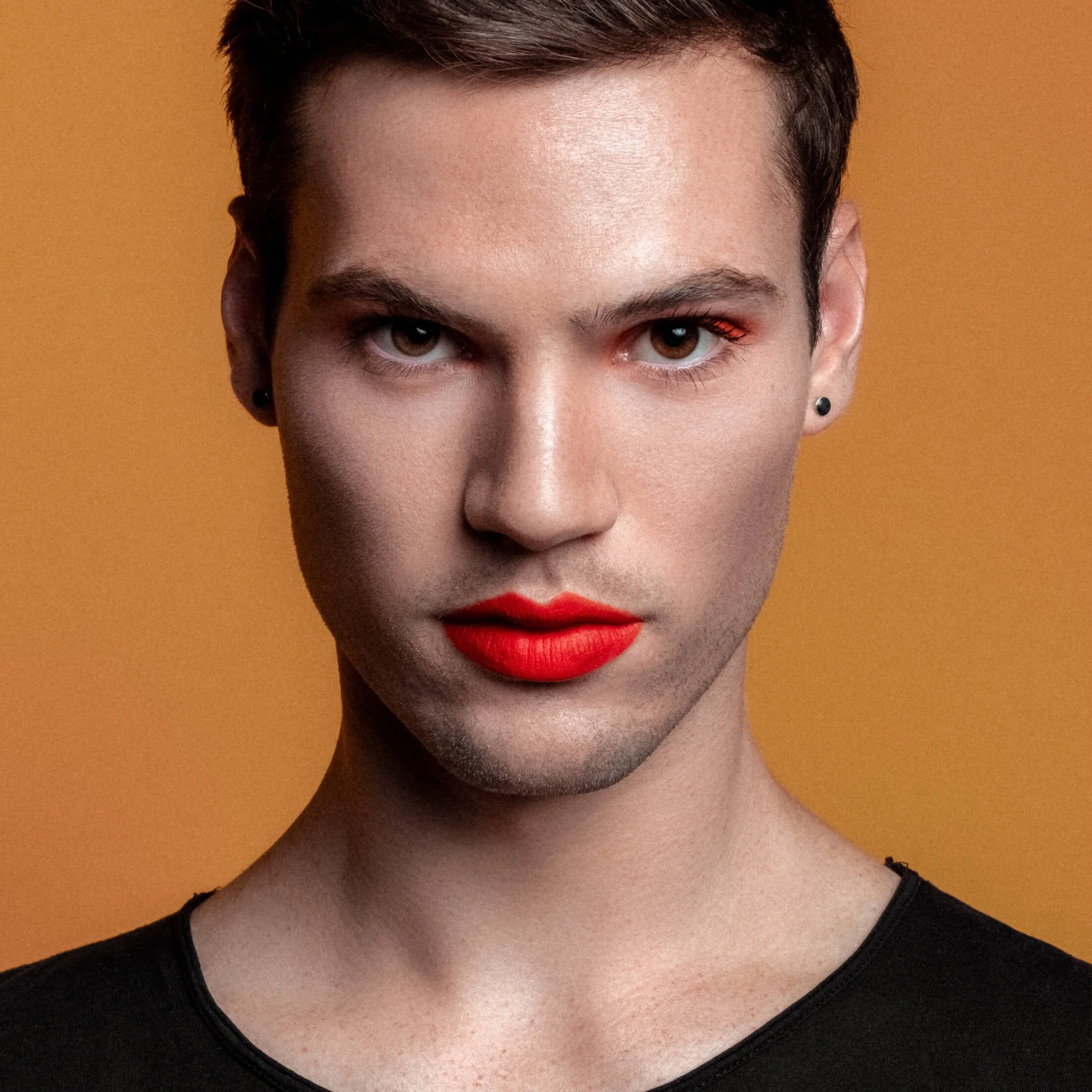 non binary beauty pride queer red lips makeup 